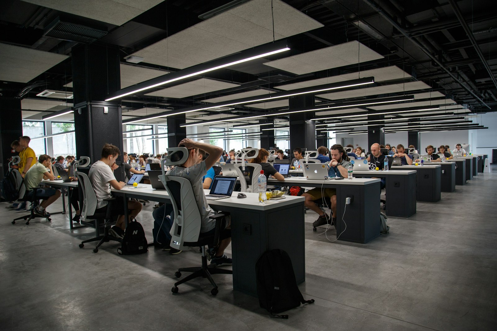 Daylight interior of the Campaign Push studio near Jalan Besar with a team reviewing creative on screen